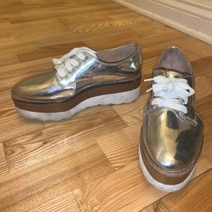 Metallic platform heel shoes with cut out detail